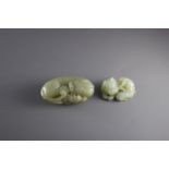 A Jade Fabulous Animal, and a Jade Lion and cubL: 6.5cm, the lion L: 4.5cm A Jade Fabulous Animal,