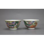 A Pair of 'Lion and Ball' Bowls, Qianlong marks, Qing Dynasty W: 8.8cm Amusingly painted in