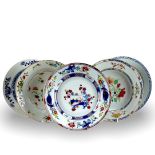 Three 'famille rose' plates, and two blue and white plates, Yongzheng/Qianlong Period, Qing
