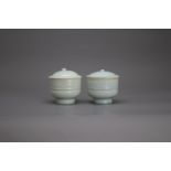 A rare Pair of Qingbai Cups and Covers,Southern Song DynastyH: 9. 5cm overall, W: 8.5cm PROPERTY