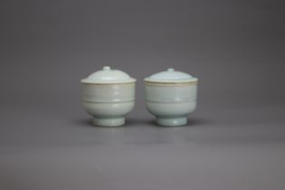 A rare Pair of Qingbai Cups and Covers,Southern Song DynastyH: 9. 5cm overall, W: 8.5cm PROPERTY