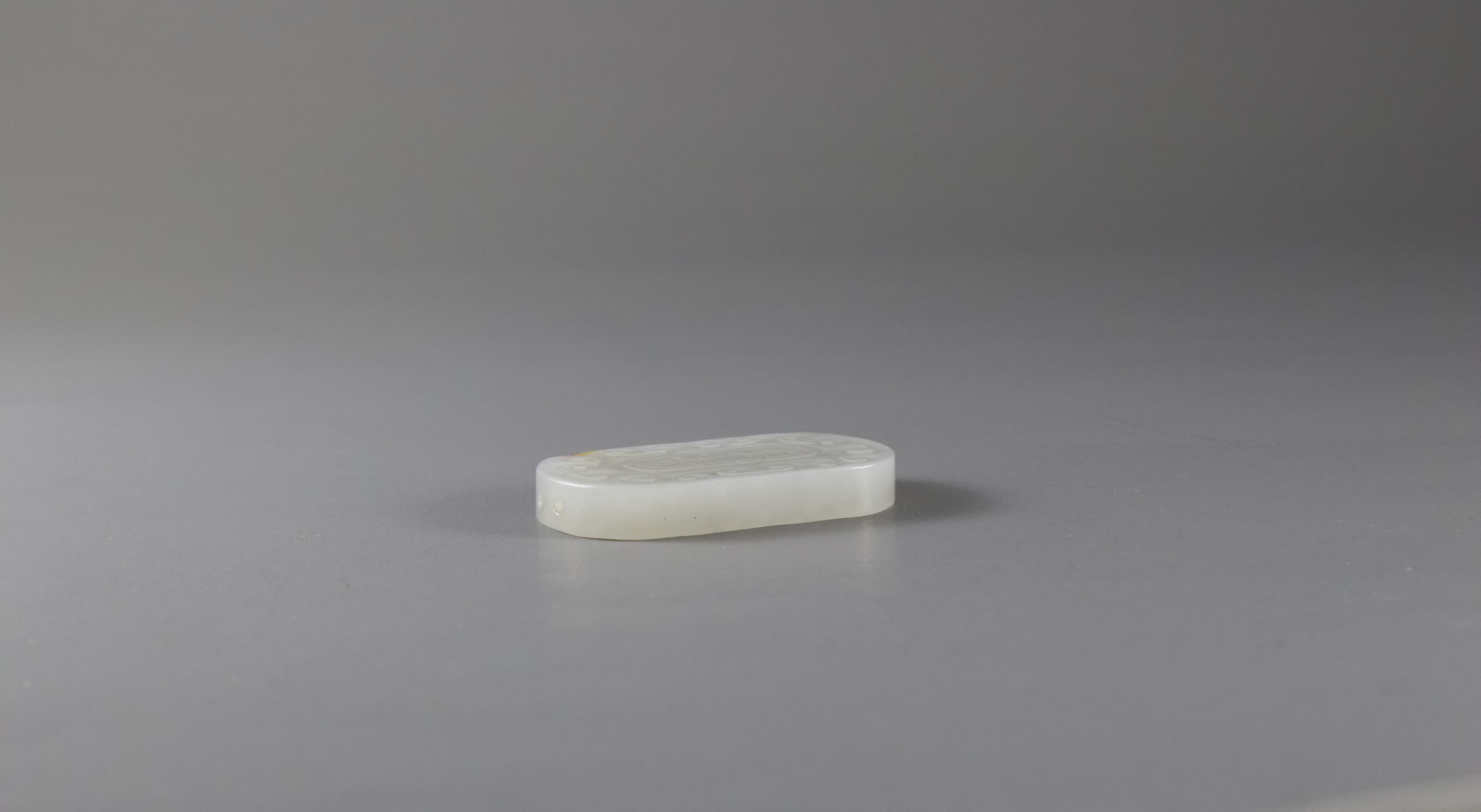 A White Jade Abstinence Plaque, Qing Dynasty or laterH: 4.5cm A White Jade Abstinence Plaque, Qing - Image 3 of 8