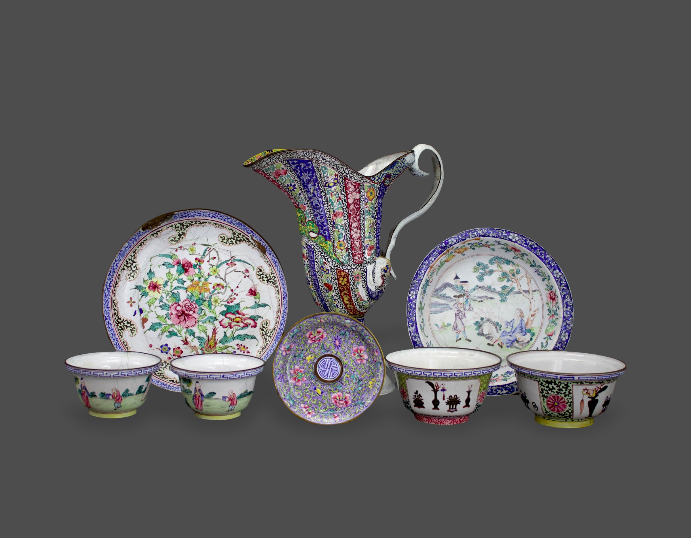 An interesting collection of Canton Enamel, 18th century the ewer H: 28 cm comprising two dishes,