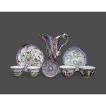 An interesting collection of Canton Enamel, 18th century the ewer H: 28 cm comprising two dishes,