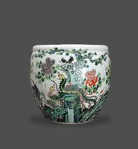 A 'famille verte' Jardiniere, 19th century W: 39cm, H: 36cm Of ovoid form, well painted on the