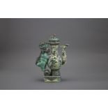 A biscuit 'famille jaune' lion handled Ewer and Cover, Guangxu Period, Qing Dynasty H:22cm, W:14.5cm