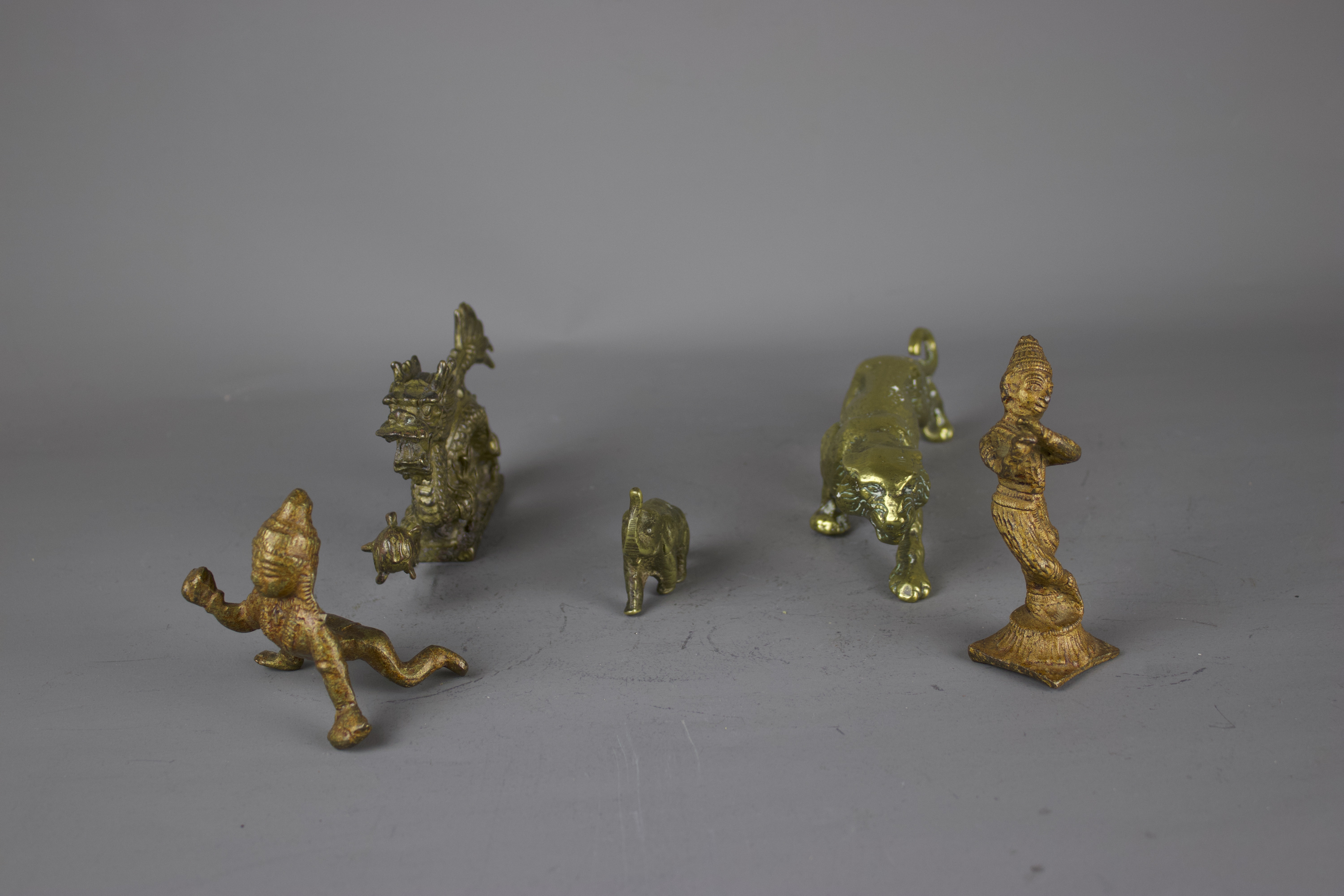 A group of metal figures, 19th / 20th century W: 15cm The heavy brass cast dragon on a plinth is - Image 2 of 4