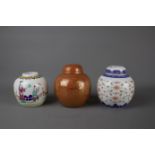 Three Chinese porcelain ginger jars, 19th/20th century. H:10cm One is decorated with a mother