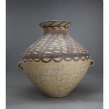 A pottery Jar, possibly Neolithic L: 43cms H: 42cms PROPERTY FROM THE COLIN HART COLLECTION The wide