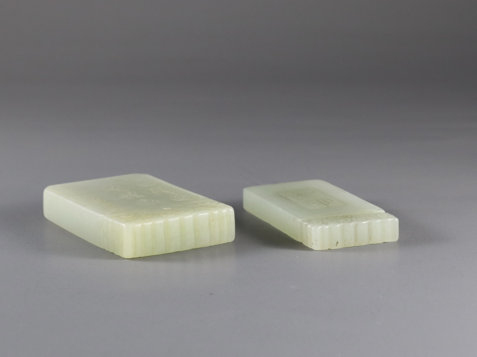 A celadon Jade rectangular Kylin Plaque, and Another, with a sage in a gardenH: 5.2cm and H: 5.5cm - Image 5 of 6