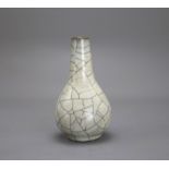 A Ge type bottle Vase H: 13.3cm the pear shaped body with soft greyish glaze, covered in a fine