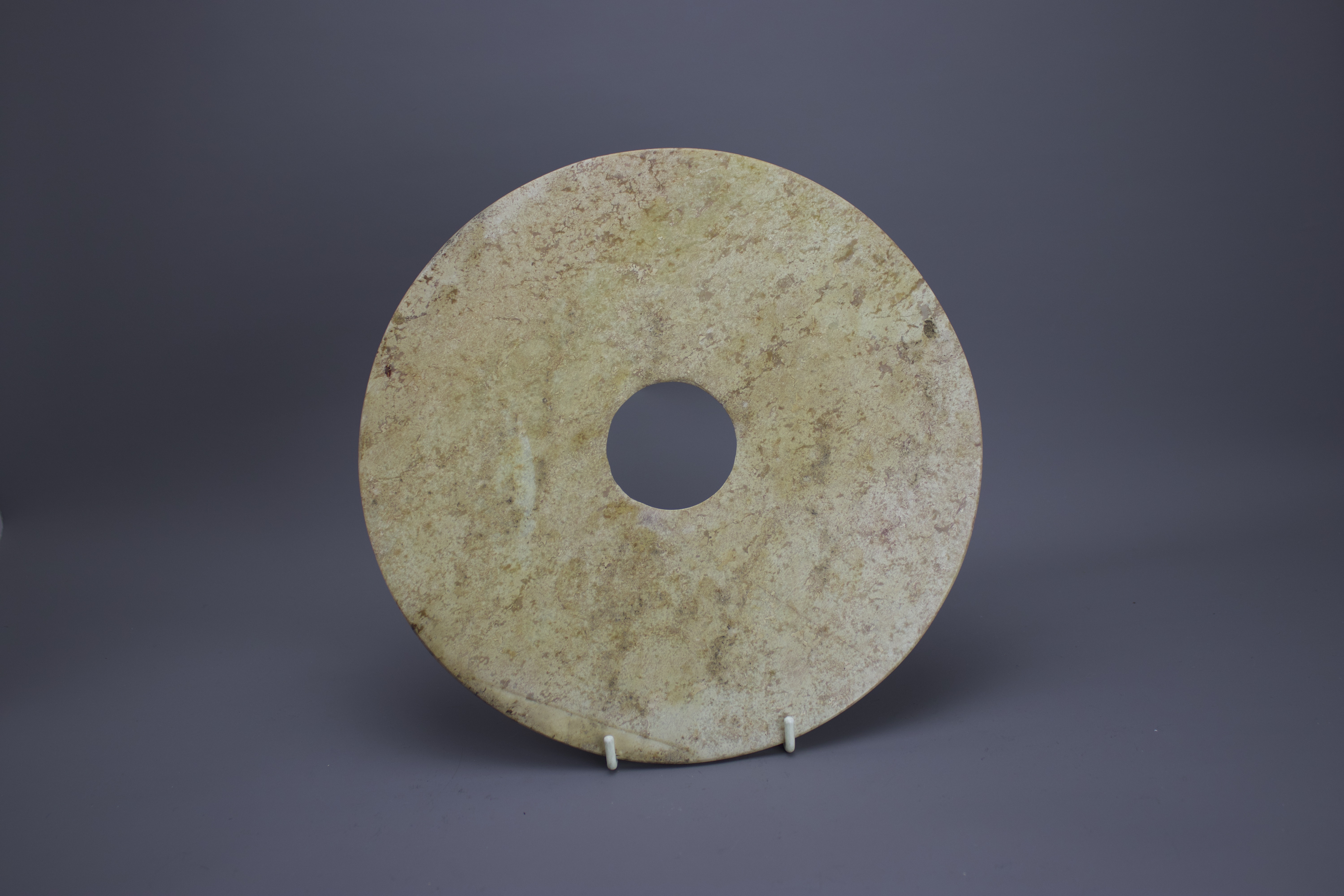 A Large archaic type Jade Bi Disc, Western Zhou or laterW: 28cm A Large archaic type Jade Bi Disc,