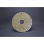 A Large archaic type Jade Bi Disc, Western Zhou or laterW: 28cm A Large archaic type Jade Bi Disc,