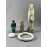 A malachite dragon snuffbottle and cover, a soapstone seal and a soapstone sage, and a glass