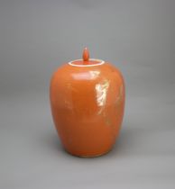 A coral glazed ovoid Jar and Cover, early 20th CenturyH: 32cm overall PROPERTY FROM THE COLIN HART