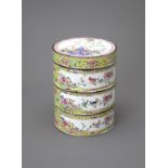 A Canton Enamel three tiered Box and Cover, Qianlong H: 11.7cm, W: 9cm Of cylindrical form, brightly