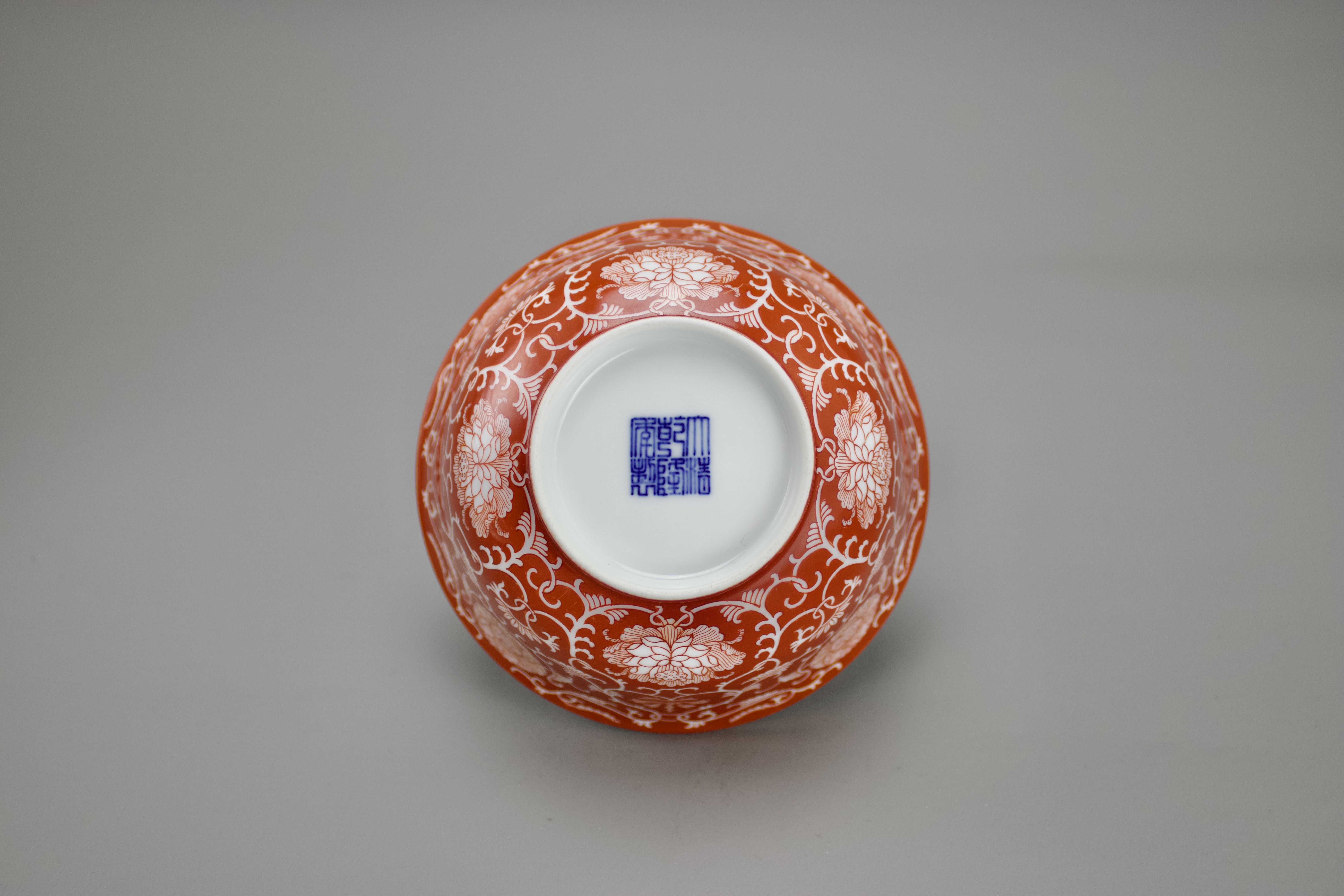 A Coral Ground Lotus Scroll Bowl, Qianlong six character underglaze blue seal mark W: 13cm painted - Image 3 of 4