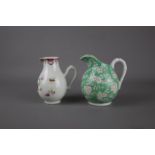 Two Chinese famille rose porcelain milk jugs, Qian Long period and 20th century respectively. H: