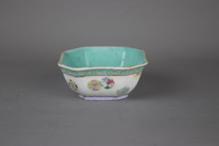 A Chinese famille rose porcelain bowl, 19th century. H: 11.5cm The interior is turquoise, exterior