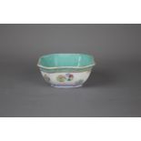 A Chinese famille rose porcelain bowl, 19th century. H: 11.5cm The interior is turquoise, exterior