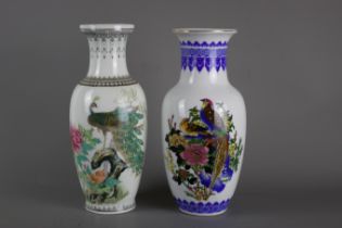 Two large Chinese baluster shaped porcelain vases, 20th century. H:26cm One is decorated with