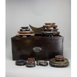 A group of wooden stands in a wooden case