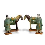 Two sancai glazed pottery Horses, with two sancai Grooms, Ming dynasty The horses H: 23.5cm, L: