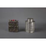 A high quality pewter tea caddy, 20th century. And a silver Chinese tea caddy, 19th century. H: 11cm