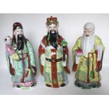 A group of hand painted "Fu Lu Shou" porcelain figures, 20th C. H: 32cm Traditional Chinese “Fu Lu