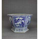 A hexagonal blue and white Jardiniere, 18th Century W: 39.5cm, H: 25cm The sides with alternating