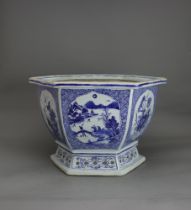A hexagonal blue and white Jardiniere, 18th Century W: 39.5cm, H: 25cm The sides with alternating