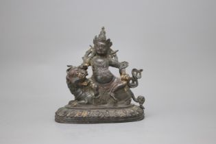 A Bronze Bodhisattva on a Seated Lion, 17th century, six character cast mark of YongleH: 18.6cm,