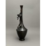A Japanese bronze 'Iris' Vase, Meiji Period H:35.5cm, W:11.5cm The elegant tall bottle vase of