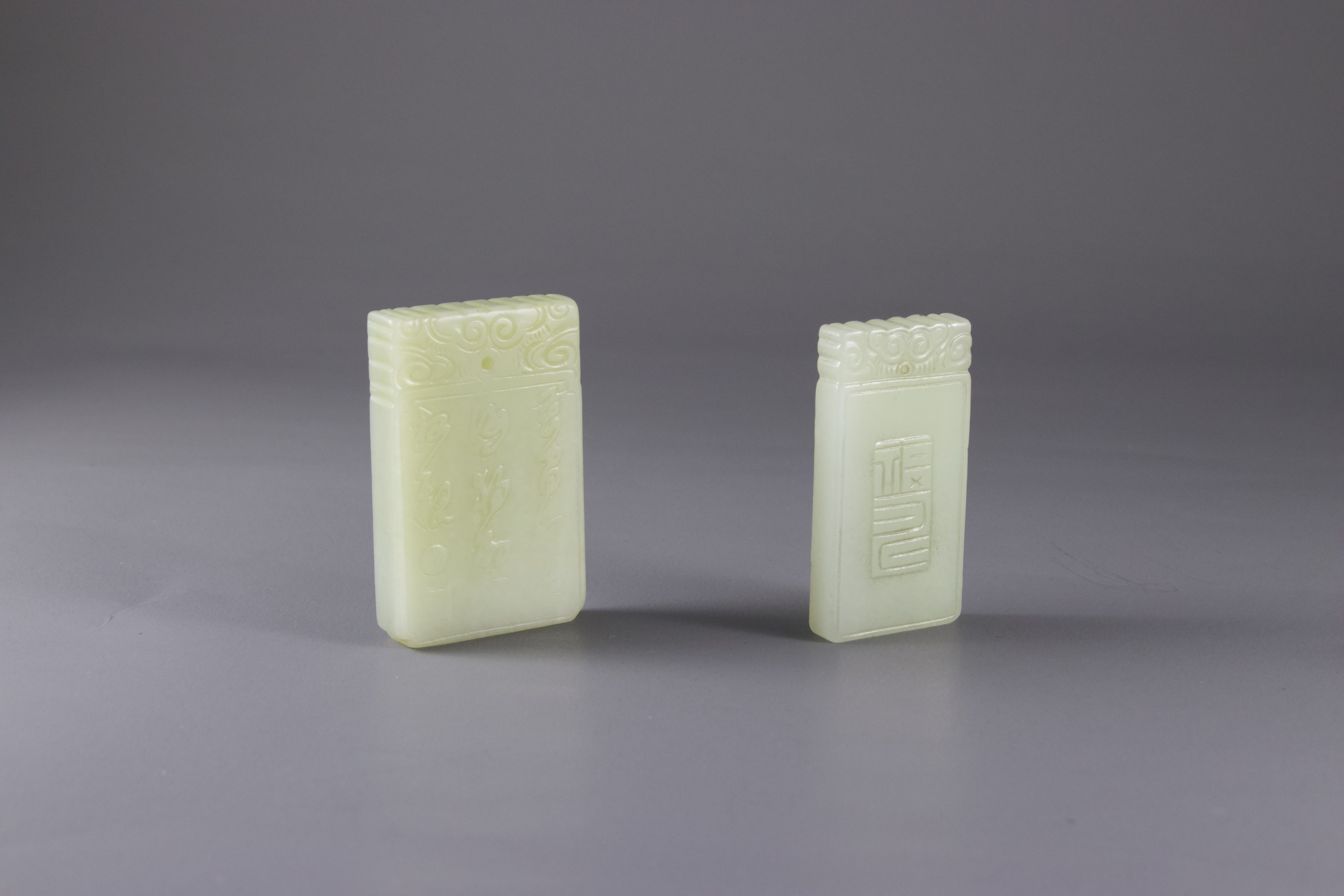 A celadon Jade rectangular Kylin Plaque, and Another, with a sage in a gardenH: 5.2cm and H: 5.5cm - Image 2 of 6