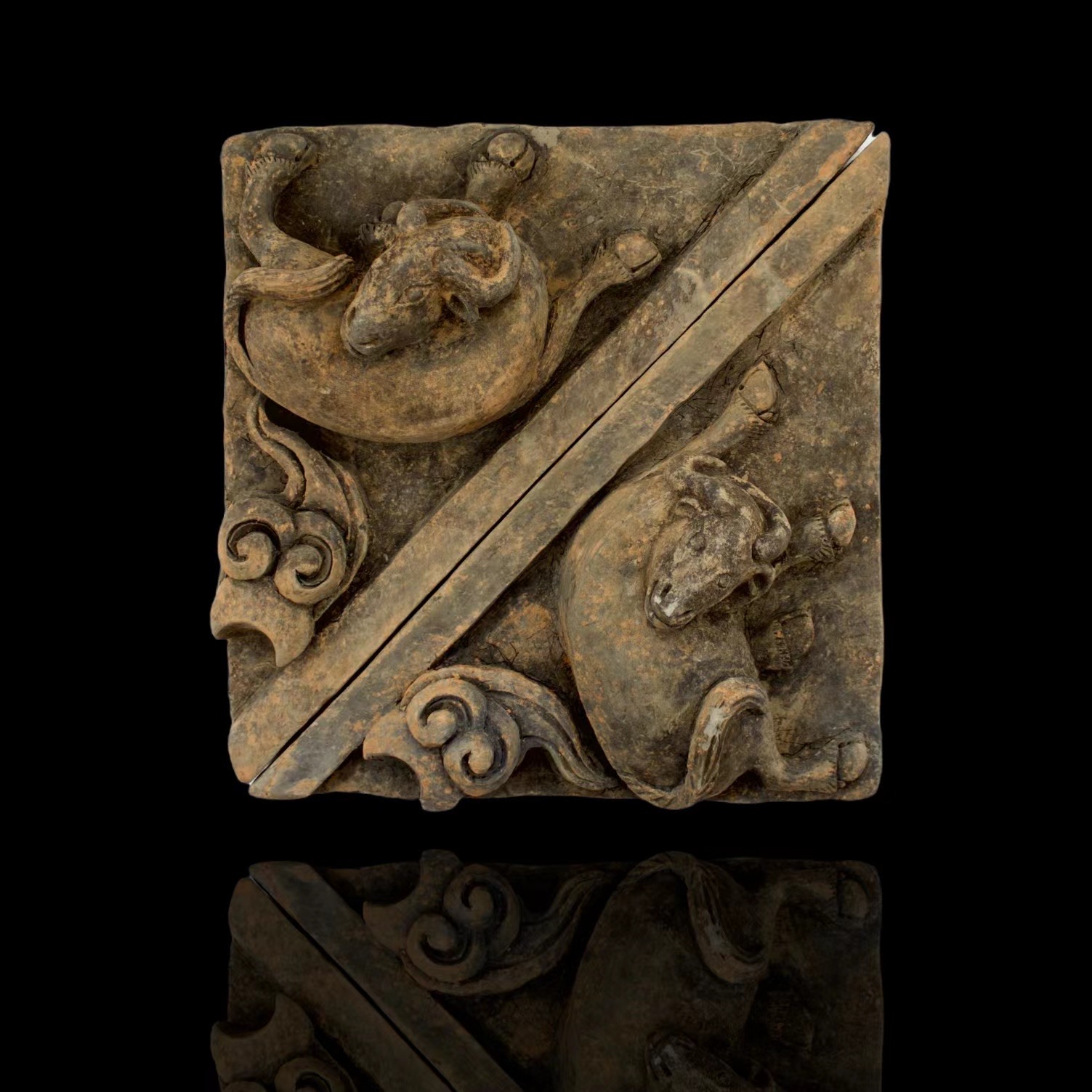 A pair of grey pottery triangular Tiles modelled with Goats, Ming Dynasty L: 26.5cm, W :27cm each - Image 2 of 8