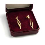 A PAIR OF 1970’S DELICATE 9CT GOLD LEAF EARRINGS In H. Samuel box. (length 3cm, approx weight 1g)