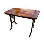 AN EARLY 20TH CENTURY COROMANDEL AND BRASS INLAID CENTRE TABLE The rectangular top raised on