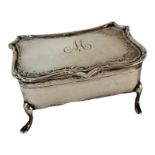 AN EDWARDIAN SILVER RECTANGULAR TRINKET BOX hallmarked Birmingham, 1907, on cabriole legs. (approx