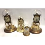 A VINTAGE KUNDO ANNIVERSARY CLOCK WITH GLASS DOME Together with three more Anniversary 400 day