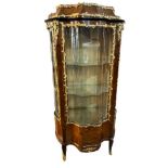 A 19TH CENTURY FRENCH WALNUT AND MARQUETRY INLAID VITRINE With rouge marble top, the body