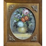 A 20TH CENTURY STILL LIFE OIL ON BOARD, A VASE OF BLOOMING FLOWERS Signed ‘Dinz’ or ‘Dina’ bottom