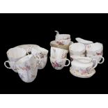 ROYAL CROWN DERBY, A MID 20TH CENTURY BONE CHINA TEA SERVICE FOR TWELVE In Posy pattern,