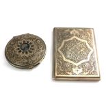 A LATE 19TH CENTURY PERSIAN SILVER CIGARETTE CASE TOGETHER WITH A 1920’S SILVER COMPACT Case