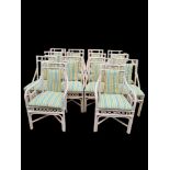 A LONG SET OF FOURTEEN CONSERVATORY PAINTED BENTWOOD OPEN ARMCHAIRS Complete with upholstered