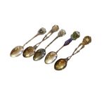 SPORT SHOOTING INTEREST, A SET OF FOUR VARIOUS NOVELTY HALLMARKED SILVER SPOONS A pair of shooting