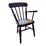 A VICTORIAN ELM AND OAK STICK BACK CHILD'S ARMCHAIR Oak seat, arm support, on baluster turned