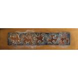 A 20TH CENTURY RECTANGULAR COPPER PANEL ON WOOD BASE Sculptured with five birds, titled ‘A Flock