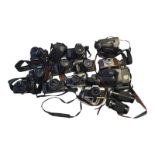 A COLLECTION OF VINTAGE CAMERAS To include Canon EOS 1000F, Canon EOS 500, Olympus, Pentax, Minolta,