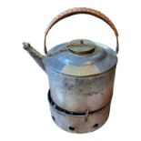 A VINTAGE ALUMINUM SPIRIT/CAMPING KETTLE AND STAND/BURNER Together with a spirit container by