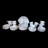 A VINTAGE ROYAL ALBERT FIFTY PIECE CHINA TEA SET Comprising twelve sandwich plates, twelve tea